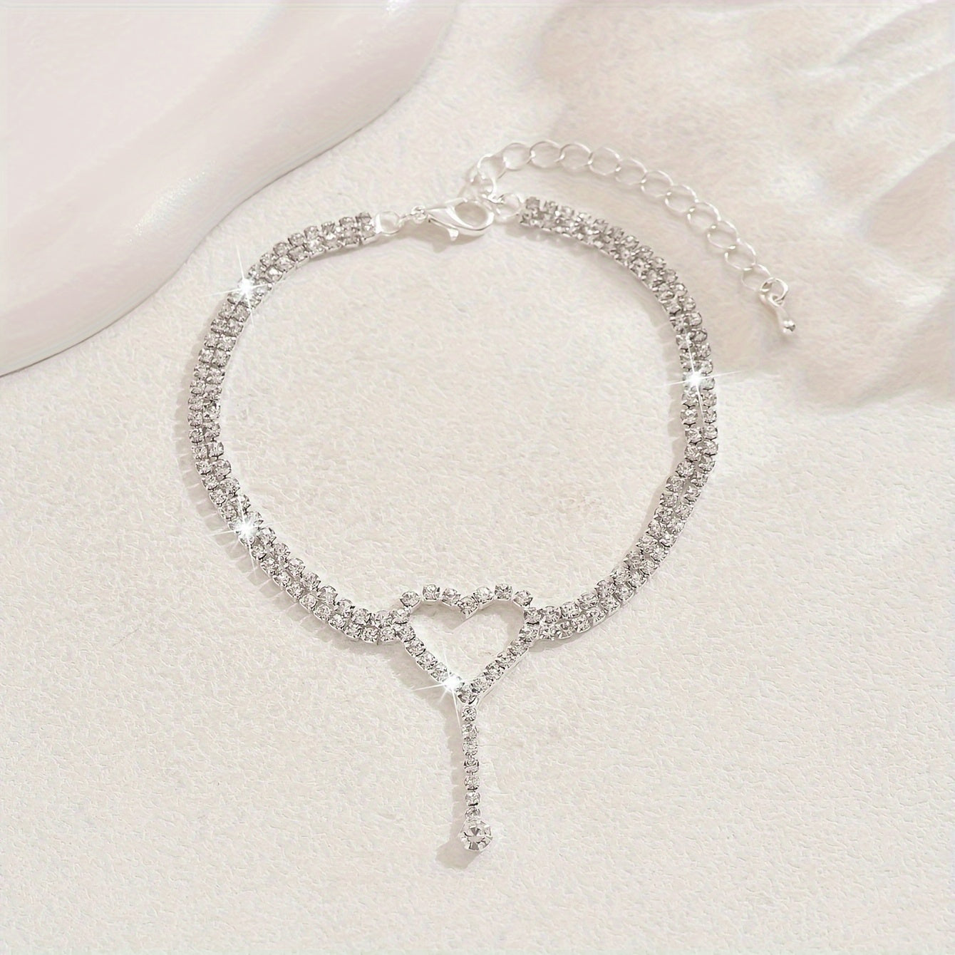 An elegant and sexy beach anklet with a heart design, perfect for parties or dancing events