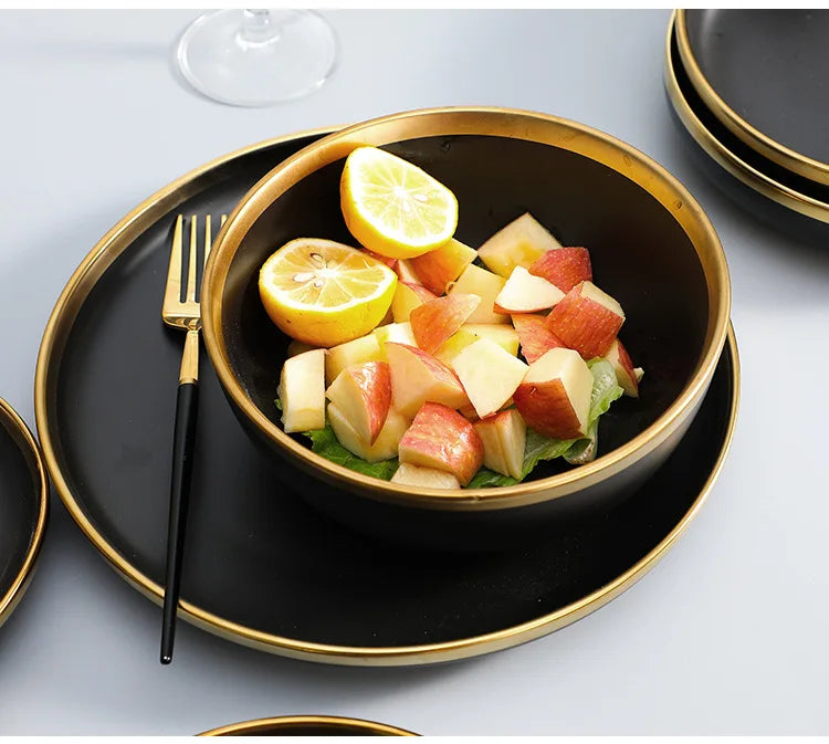 Black Porcelain Dinnerware Set with Gold Rim, Ceramic Plates, Bowls & Cutlery for Home & Restaurant Use