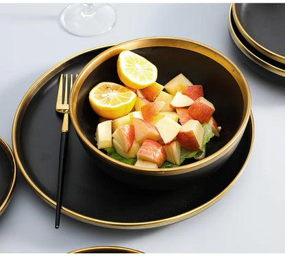 Black Porcelain Dinnerware Set with Gold Rim, Ceramic Plates, Bowls & Cutlery for Home & Restaurant Use